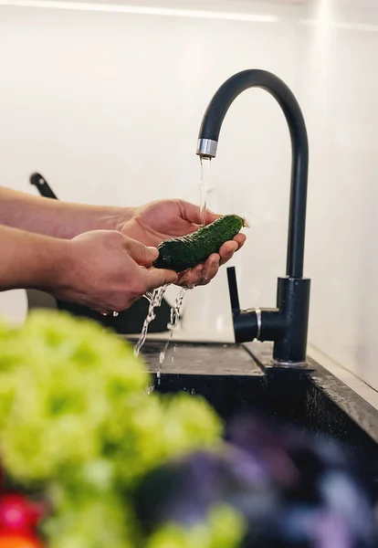 close up of washing the vegetables
