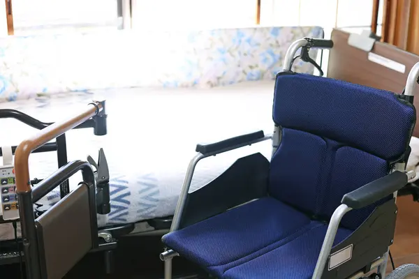Folding small wheelchair and electric bed for nursing care