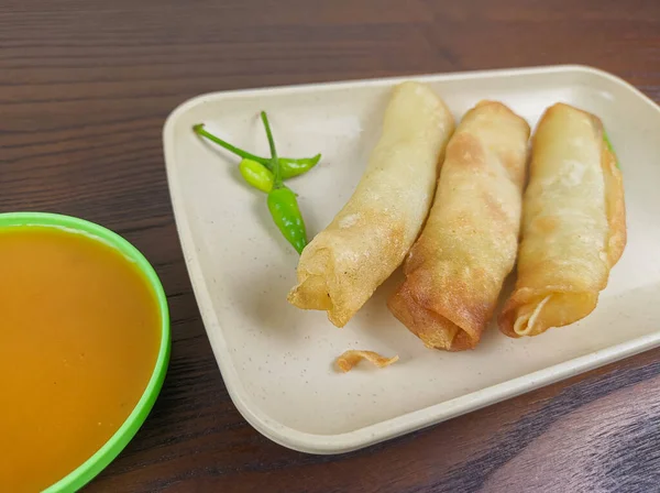 stock image traditional snack food from Indonesia. spring rolls are foods fried with chili sauce seasoning