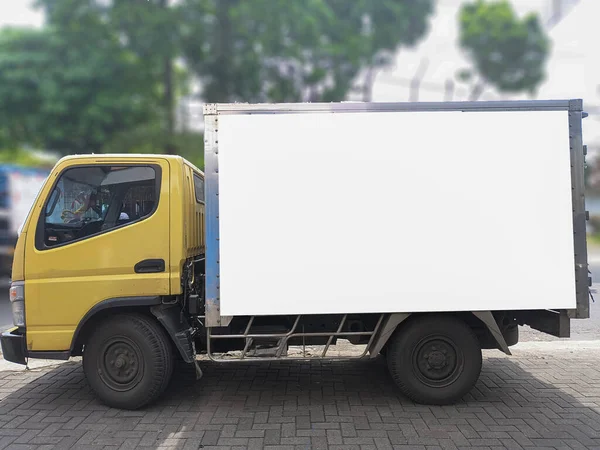 side of shipper box in truck car with blank billboard mockup, blank ad poster template, information banner placeholder mock up