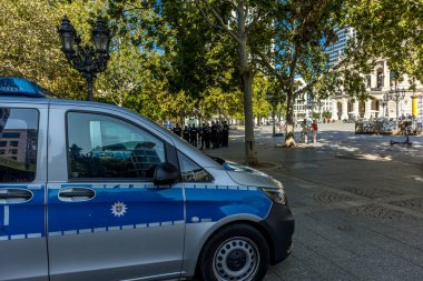 Frankfurt, Germany - 30th September 2022: Photographer visiting Frankfurt, observing a group of police men preparing for a demonstration at the old opera and its surroundings.