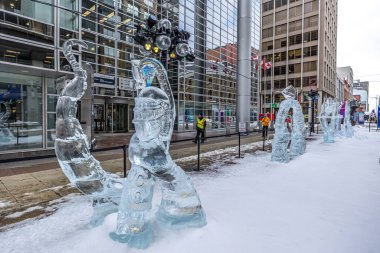 Ottawa, Canada - February 08th 2023: A german photographer discovering the pedestrian zone in downtown Ottawa, viewing ice sculptures of the so called winter lude.