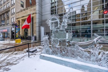 Ottawa, Canada - February 08th 2023: A german photographer discovering the pedestrian zone in downtown Ottawa, viewing ice sculptures of the so called winter lude.
