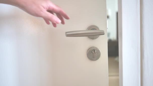 Female Hand Closing White Wooden Door Business Hotel House Condominium — Stock Video