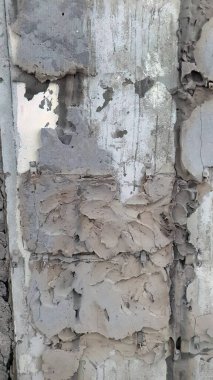 Yapım aşamasında kapatma, yıkma, var olan alçı duvarın soyulma dokusunu gösterme, soyut, sanat, arka plan veya duvar kağıdı veya dikey alan için arka plan,