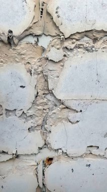 Yapım aşamasında kapatma, yıkma, var olan alçı duvarın soyulma dokusunu gösterme, soyut, sanat, arka plan veya duvar kağıdı veya dikey alan için arka plan,
