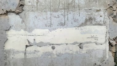 Yapım aşamasında kapatma, yıkma, var olan alçı duvarın soyulma dokusunu gösterme, soyut, sanat, arka plan veya duvar kağıdı veya kopya alanı için arka plan, yatay