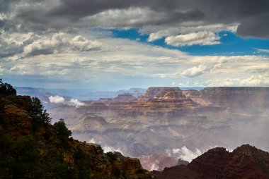 A dramatic photo of the Grand Canyon after a passing thunderstorm on a August afternoon, as seen near Lipan Point on the south rim of the canyon in Arizona, USA.