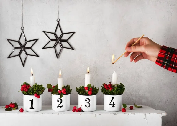Girl Hand Lighting Fourth Candle Handmade Advent Wreath Decorated Red — Stock Photo, Image