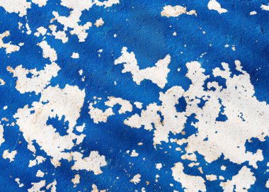 Eskimiş beton yüzey, koyu mavi ve beyaz boya ve yıpranmış parçalarla soyut bir arka plan. Klasik dekoratif öğeler.
