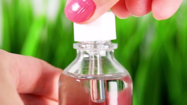 Extreme Close Oil Bottle Cosmetic Pipette Glass Bottle Macro Close — Stock Video