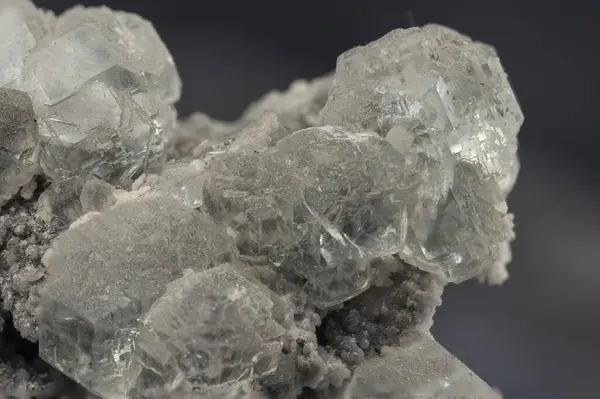 Detailed Close-Up Capturing Fluorite and Calcite Mineral's Natural Crystal Structures