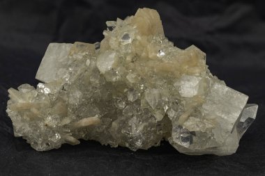 Macro of an apophyllite and stilbite mineral specimen on a black background