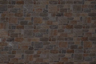 Değişik taş duvar dokusu ve karışık ton ve tuğla boyutları.