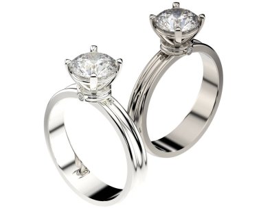 Beyaz arkaplanda izole edilmiş değerli yüzükler     