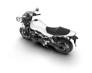 Siyah arka planda beyaz motosiklet izole edilmiş.