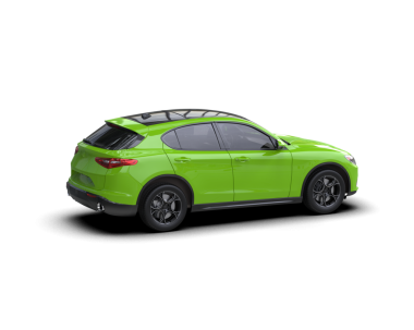 Stüdyoda izole edilmiş yeşil bir araba.