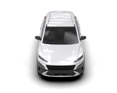 Stüdyoda siyah arka planda beyaz bir sedan araba görüntüsü.