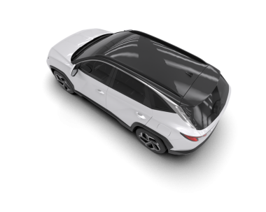 Stüdyoda beyaz arka planda izole edilmiş beyaz bir araba.