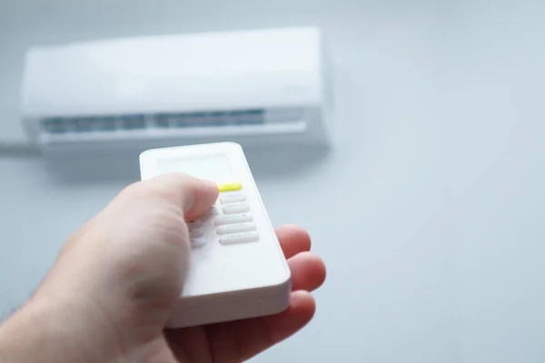 Air Conditioner Room Man Operating Remote Controller Turning Air Conditioner — Stock Photo, Image