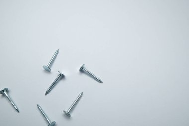 Set of metal nail head isolated on white background. Metallic nail for joining wooden detail.