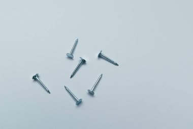 Set of metal nail head isolated on white background. Metallic nail for joining wooden detail.