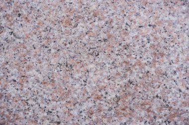 Granit desen, mimari desen. Kaba yapısı olan siyah beyaz taş dokusu. Kaya yüzeyi. Yakın plan..