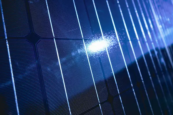 Abstract solar panels texture background with sunbeam reflection. Photovoltaic, alternative electricity source. Detail view of solar panel
