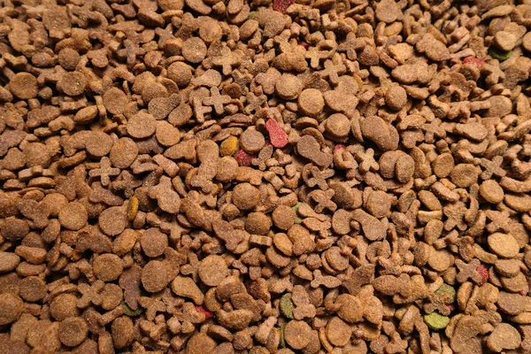 Dried cat food background. Cat food textures for backgrounds