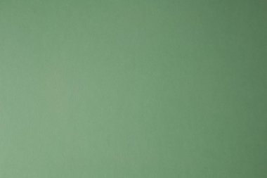 Boş açık yeşil pastel renkli kağıt desenli arka plan. Pastel yeşil kağıt dokusu veya kağıt arkaplan. Tasarım için pürüzsüz kağıt.