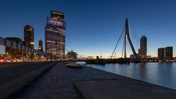 Rotterdam blue hour cityscape with a cruiseship