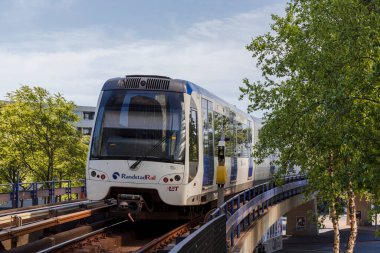 Rotterdam, the Netherlands - 2022-06-03: Rotterdam Randstadrail metro carriage driving on track