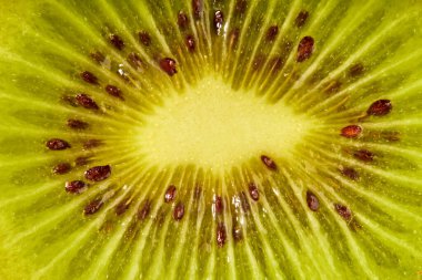 Olgun kivi üzümünün hamurunun dokusu yakın mesafeden fotoğraflanarak tasarım için bir zemin olarak kullanılabilir.