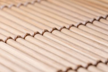 Bambu suşi paspasının dokusu yakın plan, arkaplan ve doku konsepti, makro fotoğrafçılık gibi yakın plan çekimleri ile çekildi.