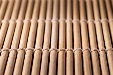 Bambu suşi paspasının dokusu yakın plan, arkaplan ve doku konsepti, makro fotoğrafçılık gibi yakın plan çekimleri ile çekildi.