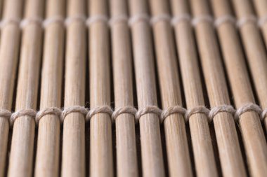 Bambu suşi paspasının dokusu yakın plan, arkaplan ve doku konsepti, makro fotoğrafçılık gibi yakın plan çekimleri ile çekildi.