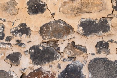 Eski bir taş duvarın dokusu, doku ve arkaplan için kullanılabilir.