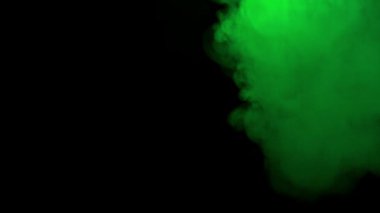 Abstract green smoke background. Smoke texture. Vapor cloud.