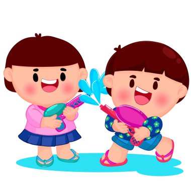 Songkran gününde su tabancasıyla oynayan şirin çocuklar.