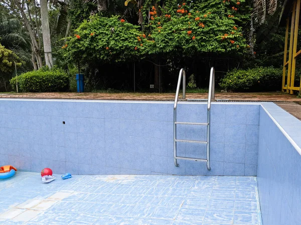 Stock image A clean swimming pool after being washed and refilled with water