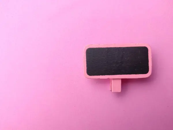 Gekleurde Houten Plank Een Roze Achtergrond Het Concept Van Kopieerruimte — Stockfoto
