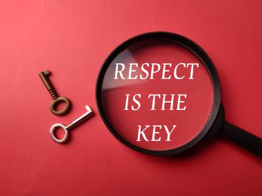 Magnifying glass and key with the word RESPECT IS THE KEY on a red background clipart