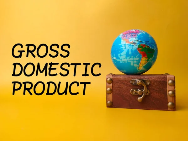 Earth globe and vintage box with the word GROSS DOMESTIC PRODUCT on yellow background