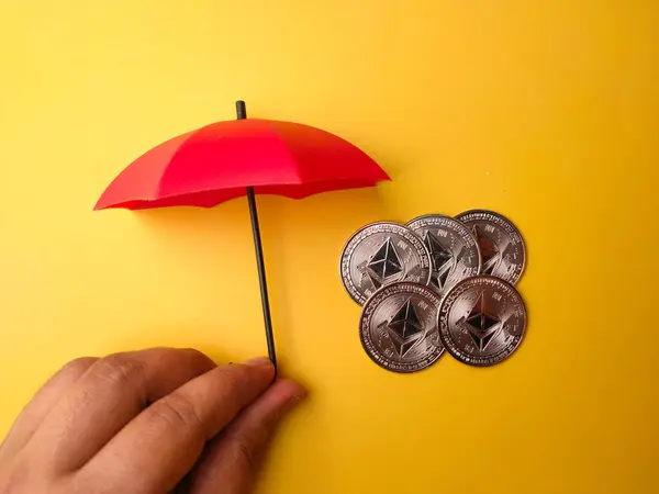 Someone Hand Holding Red Umbrella Covered Bitcoins Yellow Background — Stock Photo, Image