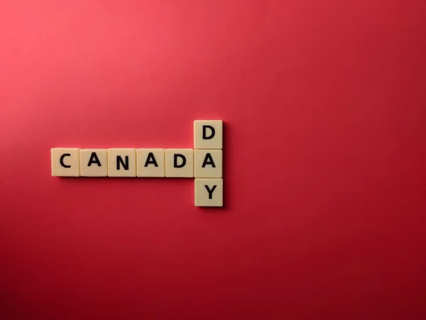 Top View Toys Letters Word Canada Day Red Background — Stock Photo, Image