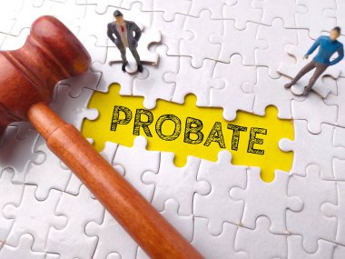 Top view miniature people and gavel with text PROBATE on puzzle background. clipart