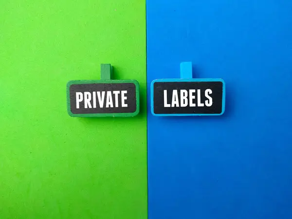 stock image Top view colored board with text PRIVATE LABELS on colorful background.