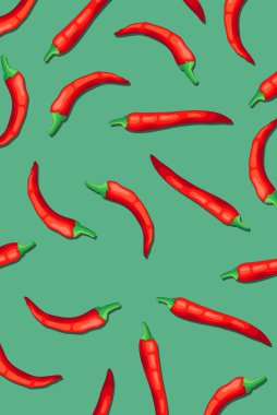 Mavi arka planda kırmızı biberli desen. Yaratıcı kavram