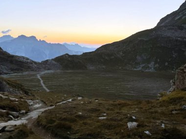 Dawn's Elevation: Peaks of Serenity in Vanoise National Park, Hautes Alps, France clipart