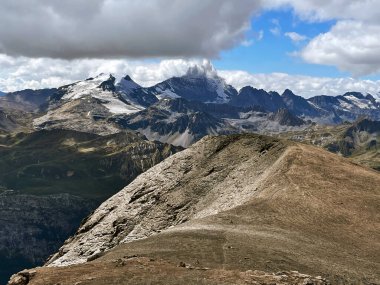 Discovering Peaks: High-Altitude Trail in Val d'Isere, aiguille de la grande sassiere, France clipart